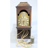 A BRASS LANTERN CLOCK