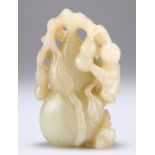 A CHINESE CELADON JADE CARVING OF A GOURD