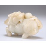 A CHINESE CELADON JADE CARVING OF A QILIN