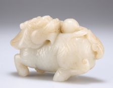 A CHINESE CELADON JADE CARVING OF A QILIN