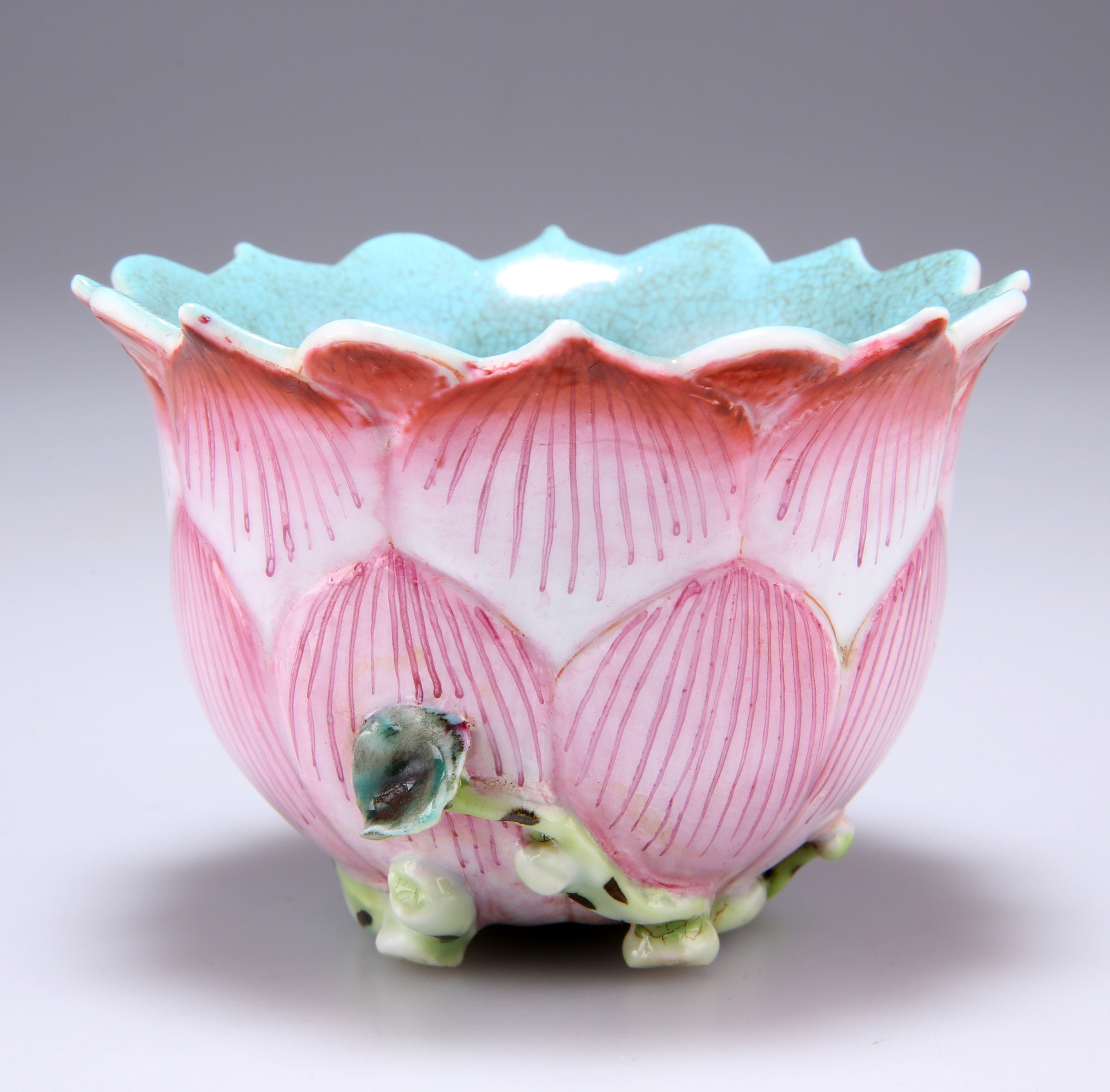 A CHINESE FAMILLE ROSE LOTUS-MOULDED PORCELAIN BOW