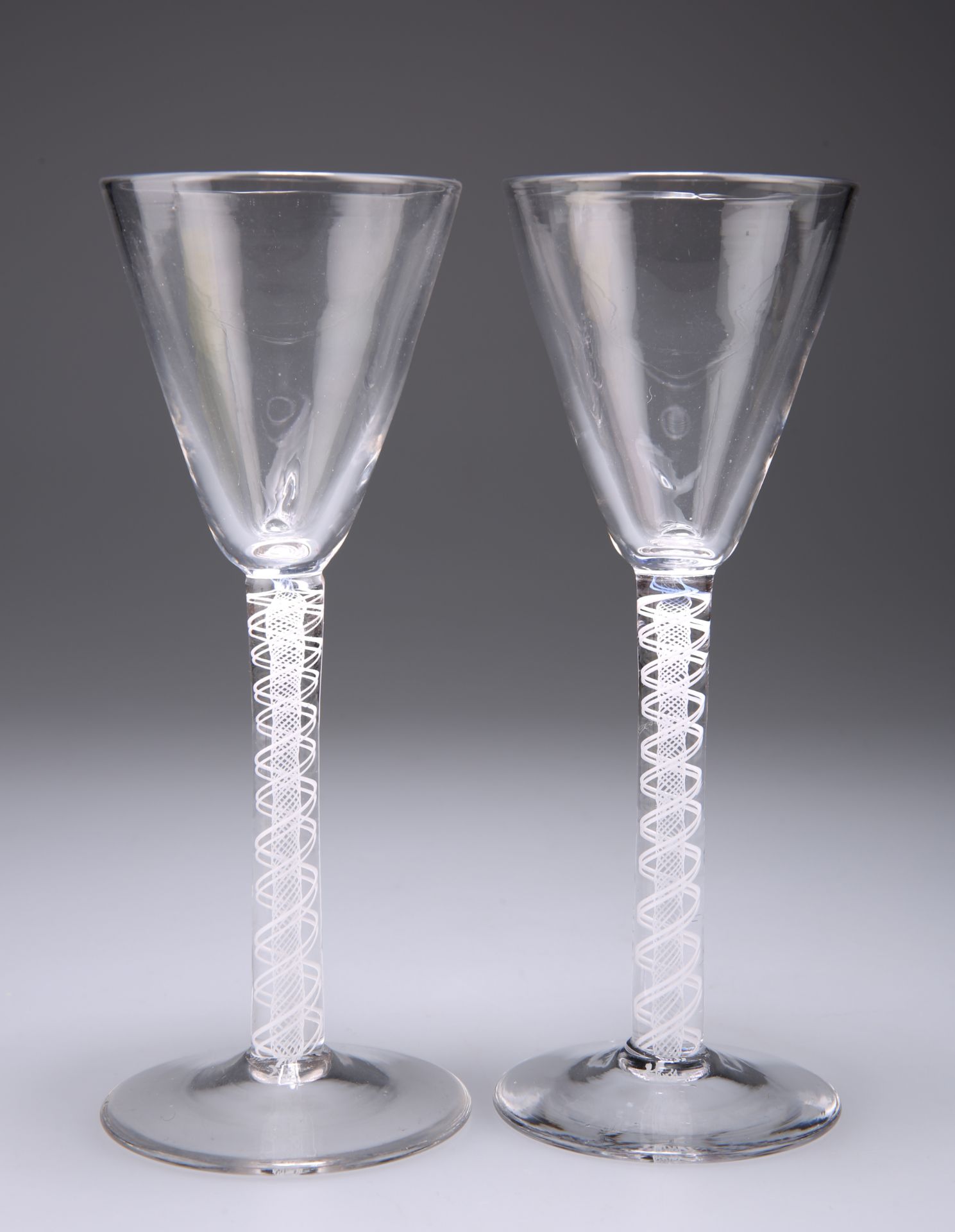 A PAIR OF OPAQUE TWIST WINE GLASSES