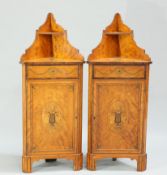 A PAIR OF EDWARDIAN INLAID SATINWOOD CORNER CABINE