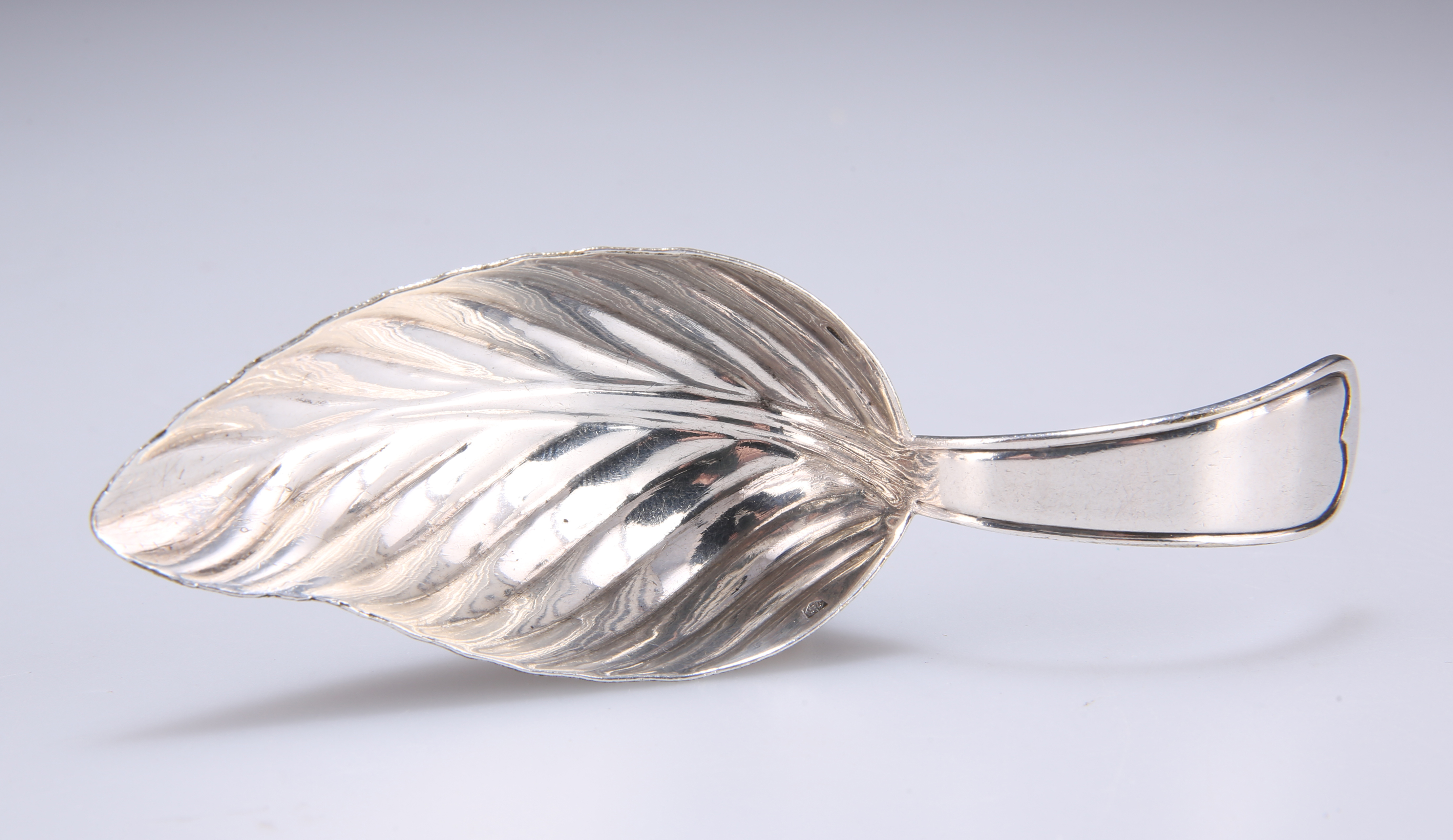 A CHRISTOFLE SILVER-PLATED CADDY SPOON