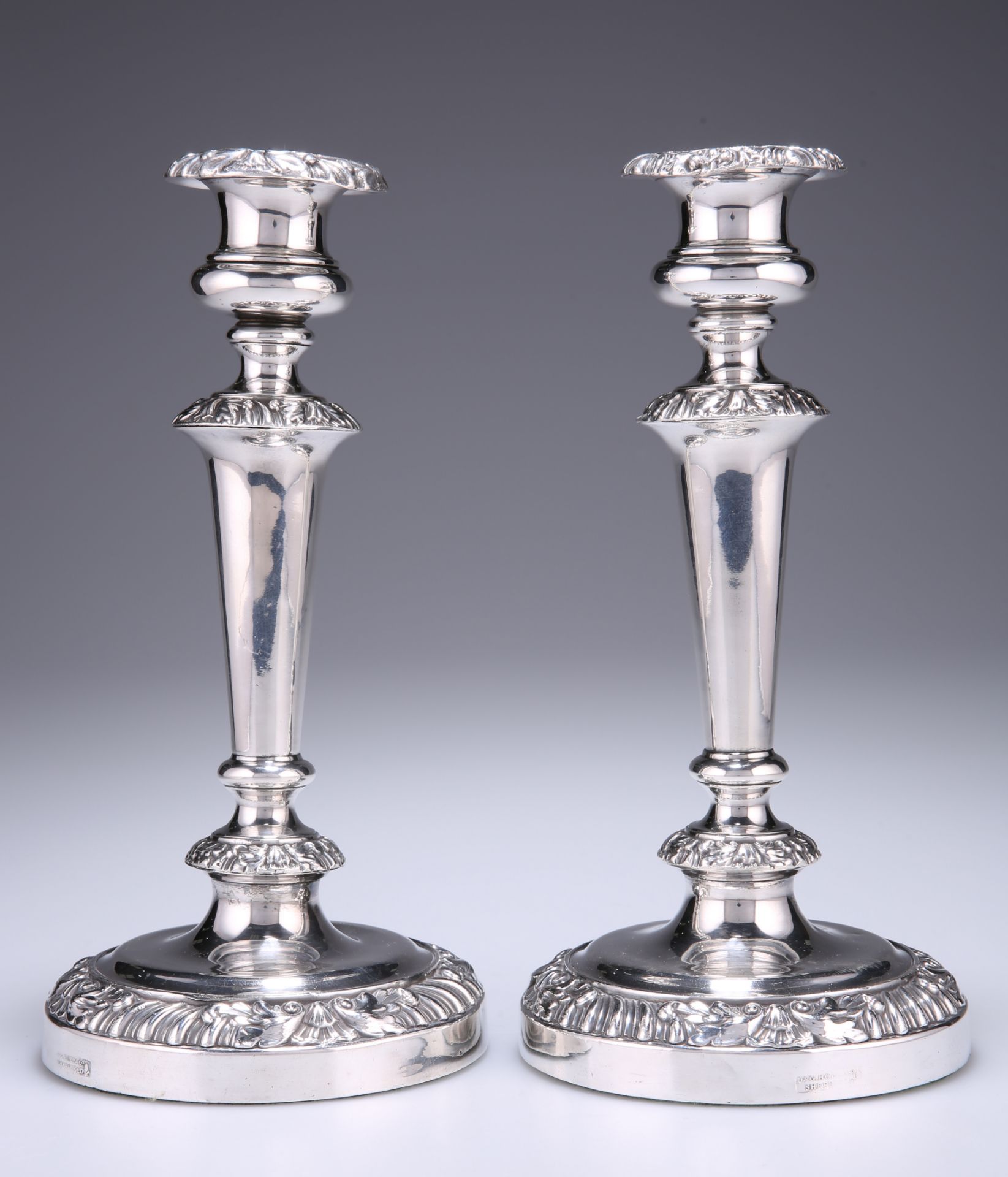 A PAIR OF OLD SHEFFIELD PLATE CANDLESTICKS