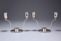 A PAIR OF GEORGE VI SILVER TWO-LIGHT CANDELABRA