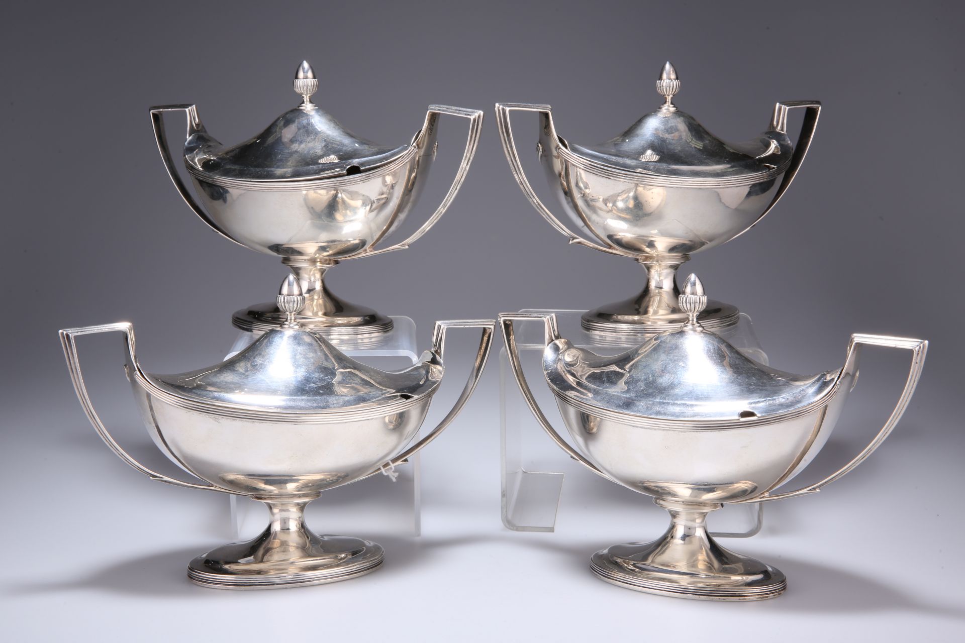 A SET OF FOUR GEORGE III SILVER SAUCE TUREENS AND COVERS