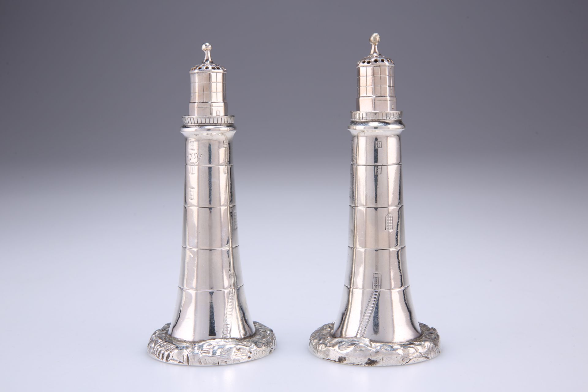 A RARE PAIR OF VICTORIAN SILVER NOVELTY LIGHTHOUSE PEPPERS