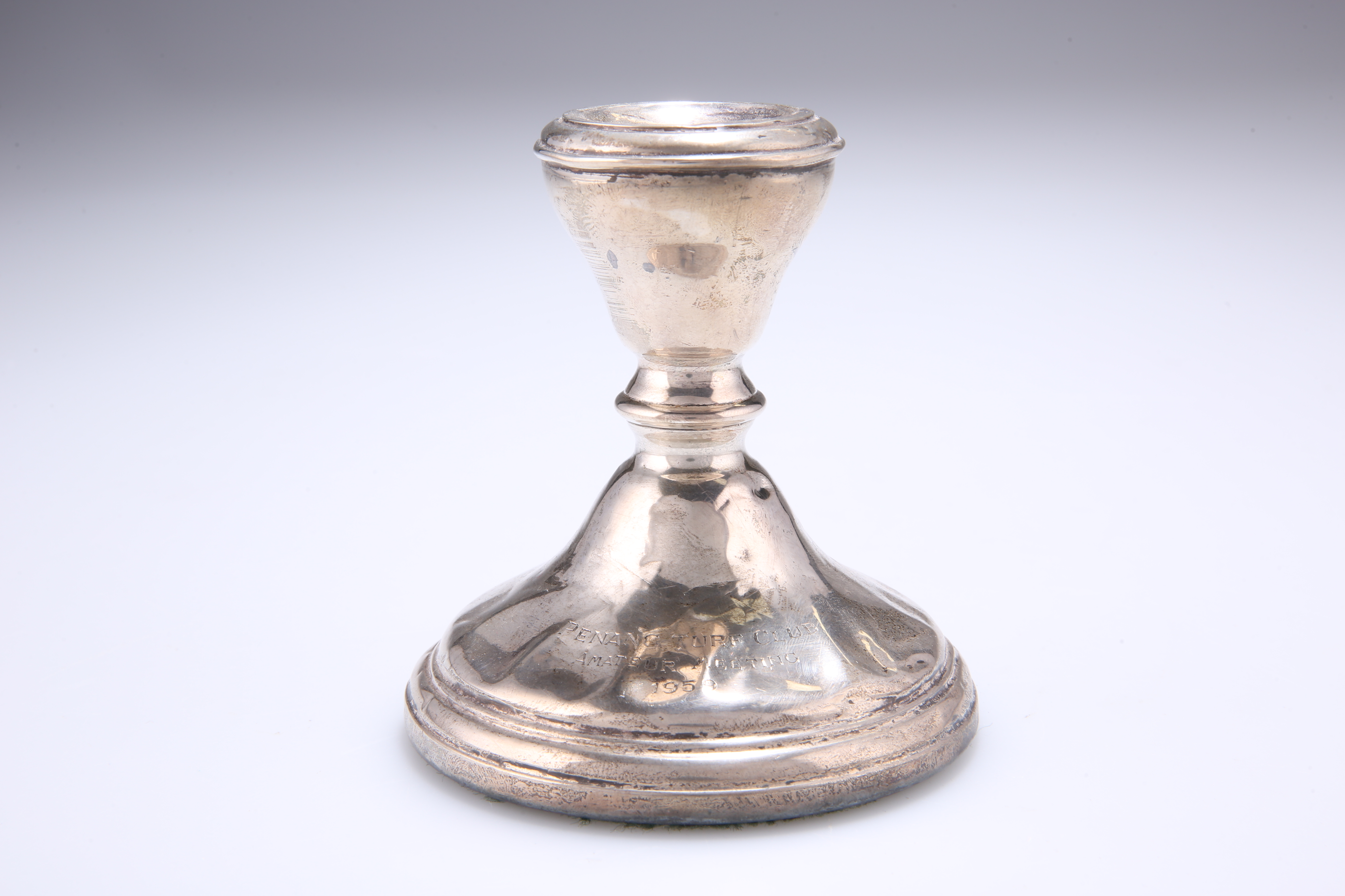 ^ AN ELIZABETH II SILVER CANDLESTICK