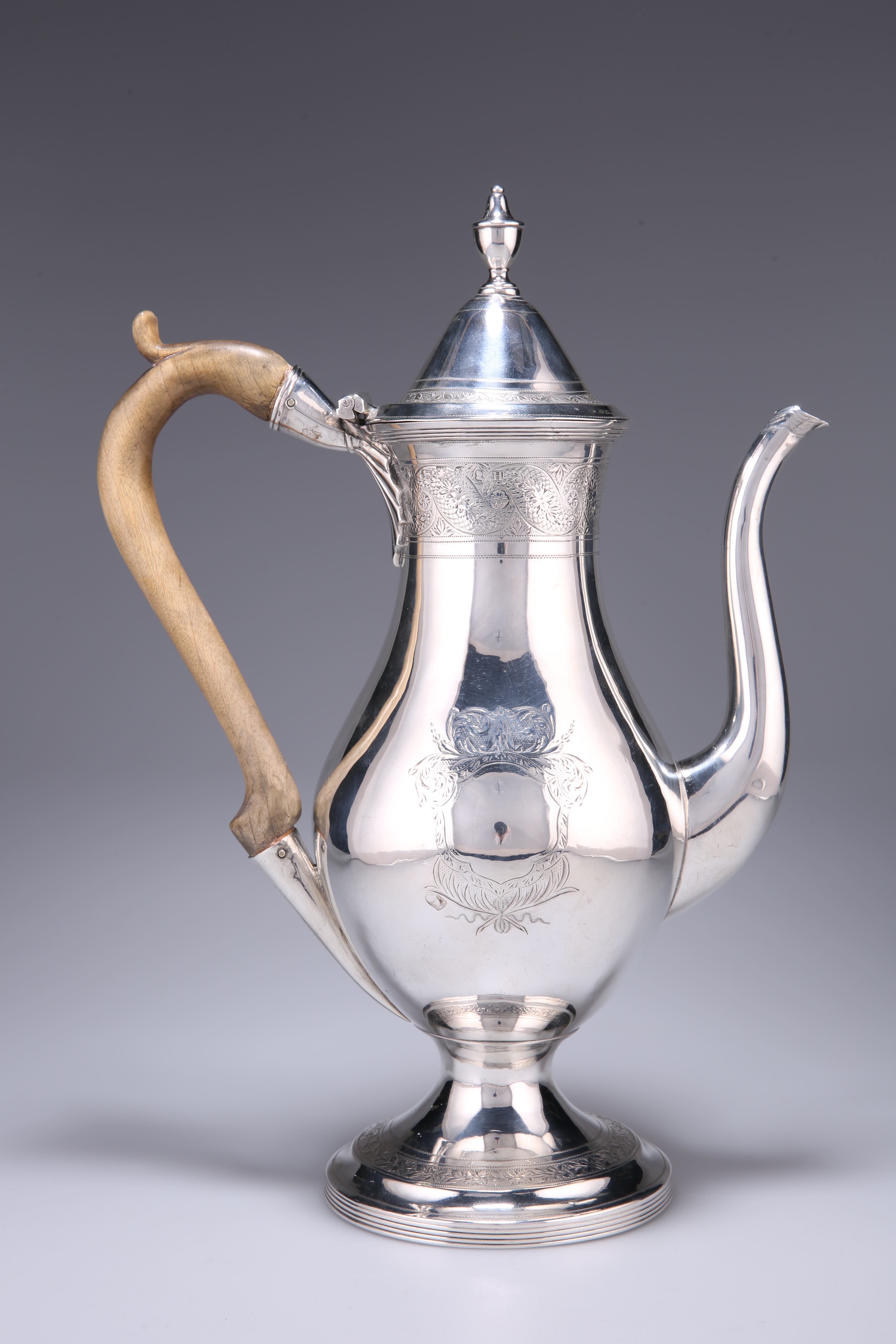 A GEORGE III SILVER COFFEE POT