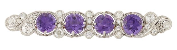 AN AMETHYST AND DIAMOND BROOCH