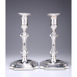 A PAIR OF EDWARDIAN SILVER CANDLESTICKS