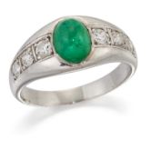 AN EMERALD AND DIAMOND RING