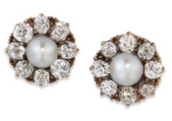 A PAIR OF DIAMOND AND BUTTON PEARL CLUSTER STUD EARRINGS