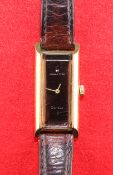 A LADY'S GOLD-PLATED HAMILTON STRAP WATCH