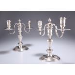 A PAIR OF SILVER-PLATED TWO-LIGHT CANDELABRA