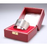 AN ELIZABETH II SILVER NAPKIN RING