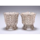 A PAIR OF VICTORIAN 'GOTHIC' SILVER SALTS