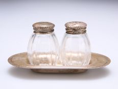A PAIR OF CHRISTOFLE SILVER-TOPPED SALT AND PEPPER POTS