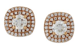 A PAIR OF 18 CARAT ROSE GOLD DIAMOND CLUSTER STUD EARRINGS