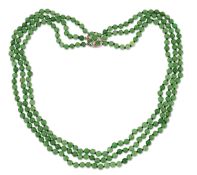 A JADE BEAD NECKLACE, WITH A JADE AND DIAMOND SET CLASP