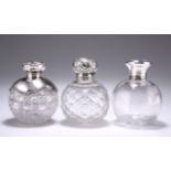 A GROUP OF THREE SILVER-MOUNTED GLASS SCENT BOTTLES