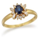 AN 18 CARAT GOLD SAPPHIRE AND DIAMOND CLUSTER RING