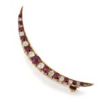 A VICTORIAN RUBY AND DIAMOND CRESCENT BROOCH