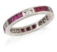 A RUBY AND WHITE SAPPHIRE ETERNITY RING