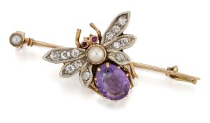 AN EDWARDIAN GEM SET INSECT BROOCH