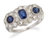 A SAPPHIRE AND DIAMOND CLUSTER RING