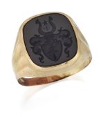 AN ONYX INTAGLIO SIGNET RING