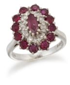 AN 18 CARAT WHITE GOLD RUBY AND DIAMOND CLUSTER RING