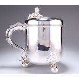 A VICTORIAN SILVER LIDDED TANKARD OF SUBSTANTIAL PROPORTIONS