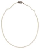 A CULTURED PEARL NECKLACE, WITH A DIAMOND SET CLASP