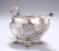 A GEORGE IV IRISH SILVER CREAM JUG