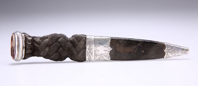 A SCOTTISH SILVER-MOUNTED SGIAN DUBH