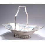 A GEORGE III SILVER CAKE BASKET