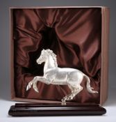 AN ELIZABETH II CAST SILVER MODEL OF A STALLION