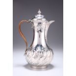 A LATE GEORGE II SILVER HOT WATER JUG