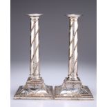 A PAIR OF OLD SHEFFIELD PLATE CANDLESTICKS