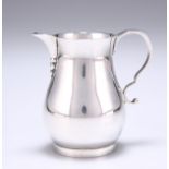 A GEORGE V SILVER CREAM JUG