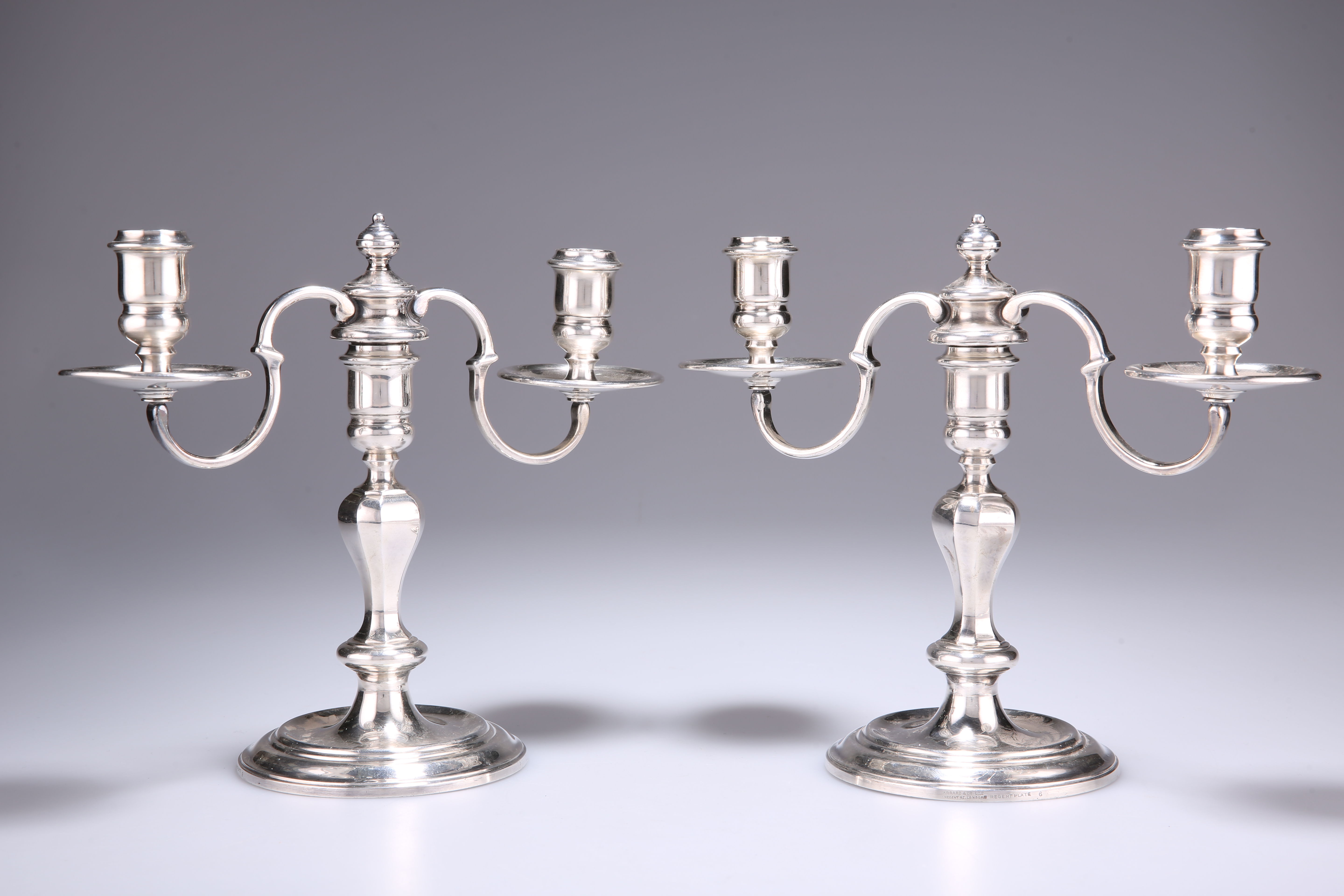 A PAIR OF SILVER-PLATED TWO-LIGHT CANDELABRA - Image 2 of 2