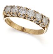 AN 18 CARAT GOLD DIAMOND HALF-HOOP RING