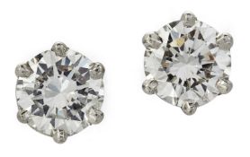 A PAIR OF 18 CARAT WHITE GOLD DIAMOND SINGLE-STONE STUD EARRINGS