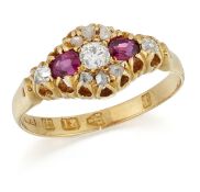 A VICTORIAN 18 CARAT GOLD RUBY AND DIAMOND CLUSTER RING