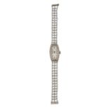 A LADY'S ART DECO DIAMOND AND PEARL BRACELET WATCH