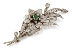 AN EARLY TWENTIETH CENTURY TSAVORITE GARNET AND DIAMOND SPRAY BROOCH