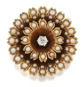 A LATE 19TH CENTURY DIAMOND AND SEED PEARL FLOWER BROOCH