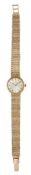 A LADY'S 9 CARAT GOLD OMEGA BRACELET WATCH